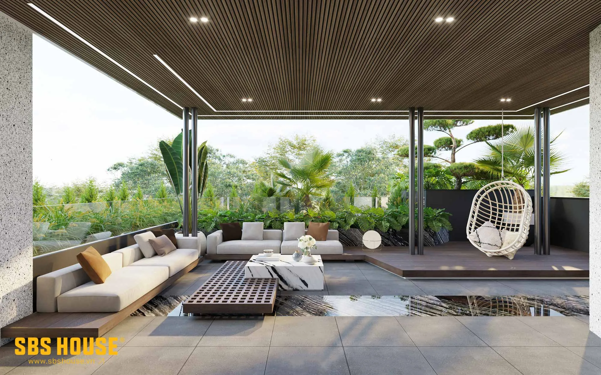 Sân thượng với không gian rộng mở, ở các phía đều là cây xanh được bố trí khéo léo. Gia chủ có thể lên đây thư giãn, hóng mát mỗi chiều