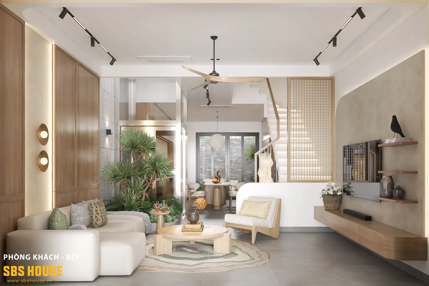 Phòng khách gọn gàng, sáng và thoáng, giữ trọn cảm giác riêng tư nhờ chiều sâu công trình.