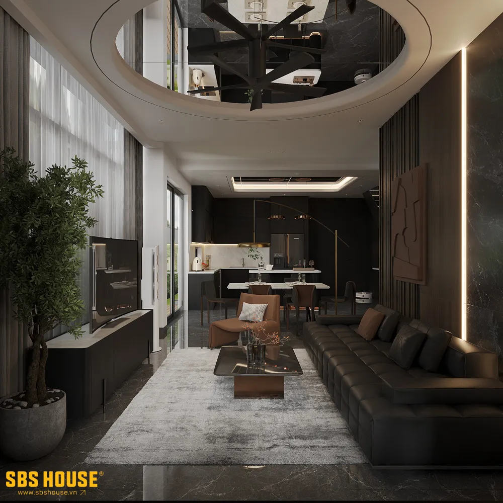 Không gian tầng 1 được mở rộng và kết nối trực tiếp với sân vườn, tạo cảm giác sinh hoạt chung luôn thoáng đãng và gần gũi.