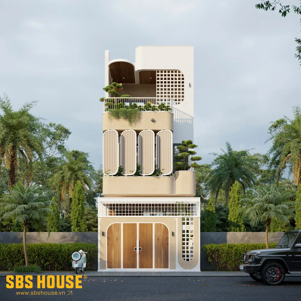 Mặt tiền T’s House được thiết kế như một lớp đệm khí hậu, giúp giảm tác động trực tiếp của nắng Tây Bắc, đồng thời giữ cho ngôi nhà luôn thông thoáng và đủ riêng tư.