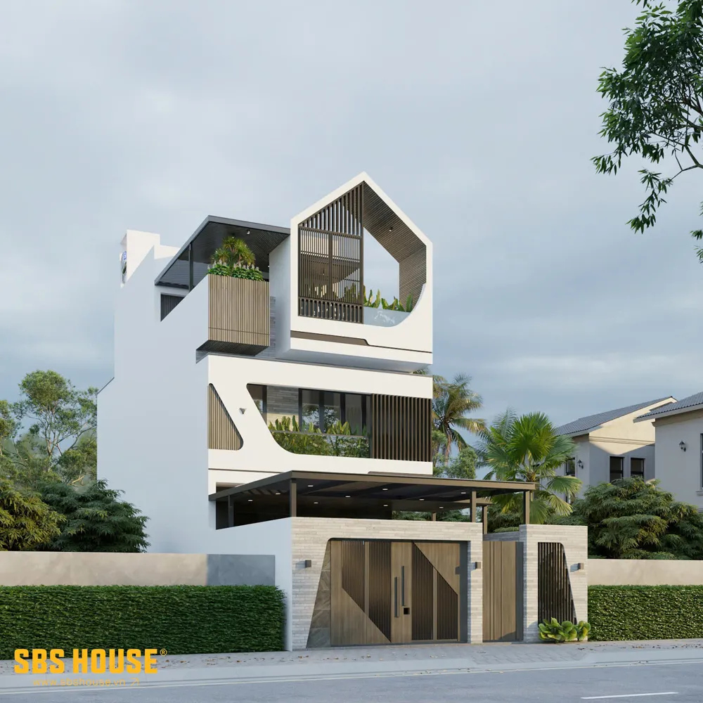 Hệ cửa kính lớn ở hướng Đông không chỉ tối ưu ánh sáng tự nhiên mà còn tạo sự kết nối thị giác mạnh mẽ với lối đi bên hông, phá vỡ giới hạn không gian nhà phố. 